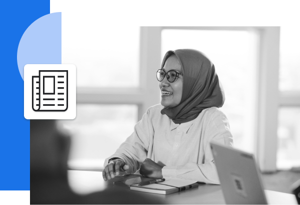 person at desk in meeting